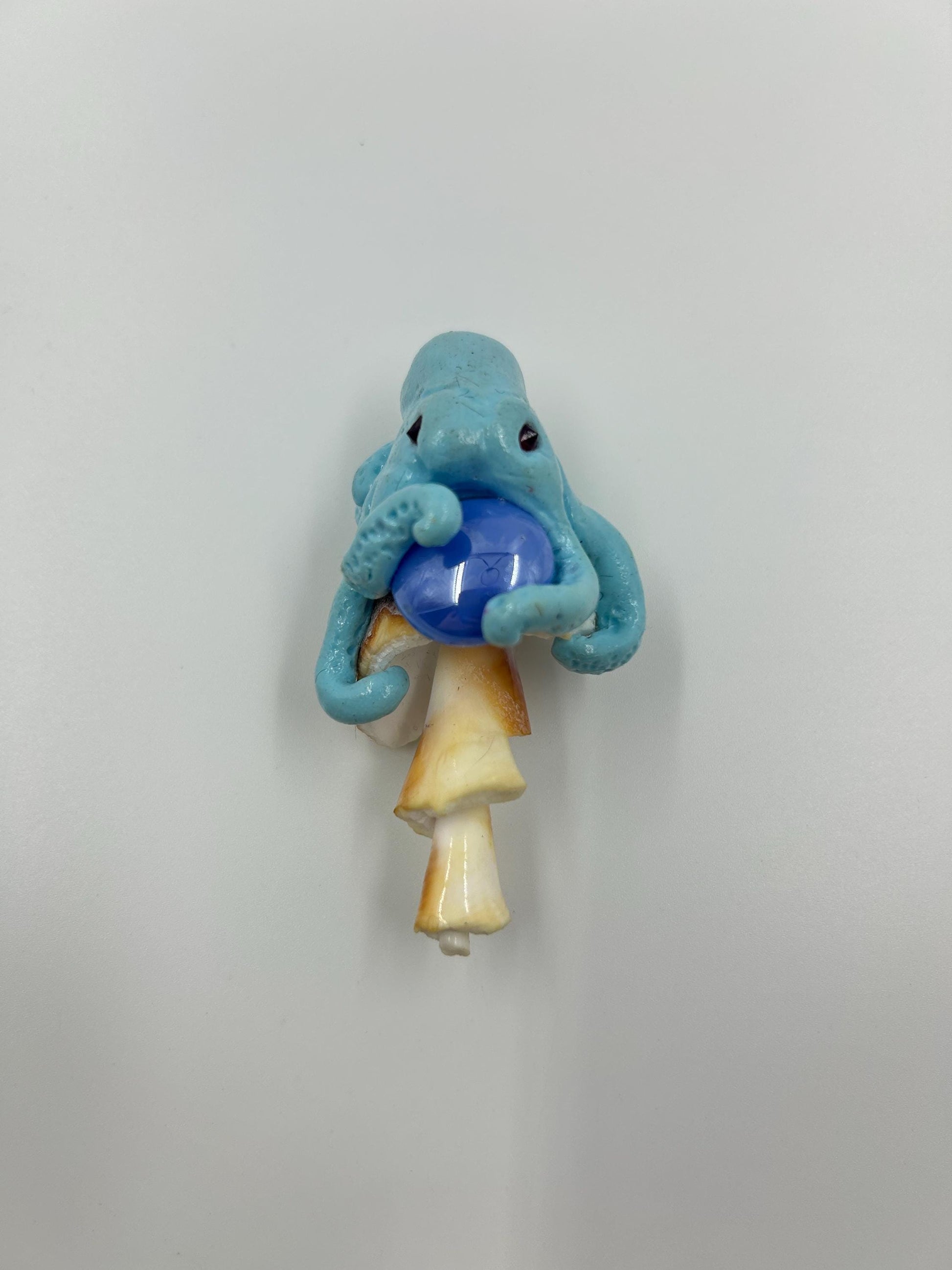 Octopus Sculpture – Handmade polymer clay octopus on seashell holding orb. Whimsical ocean art décor & sea lover gift.