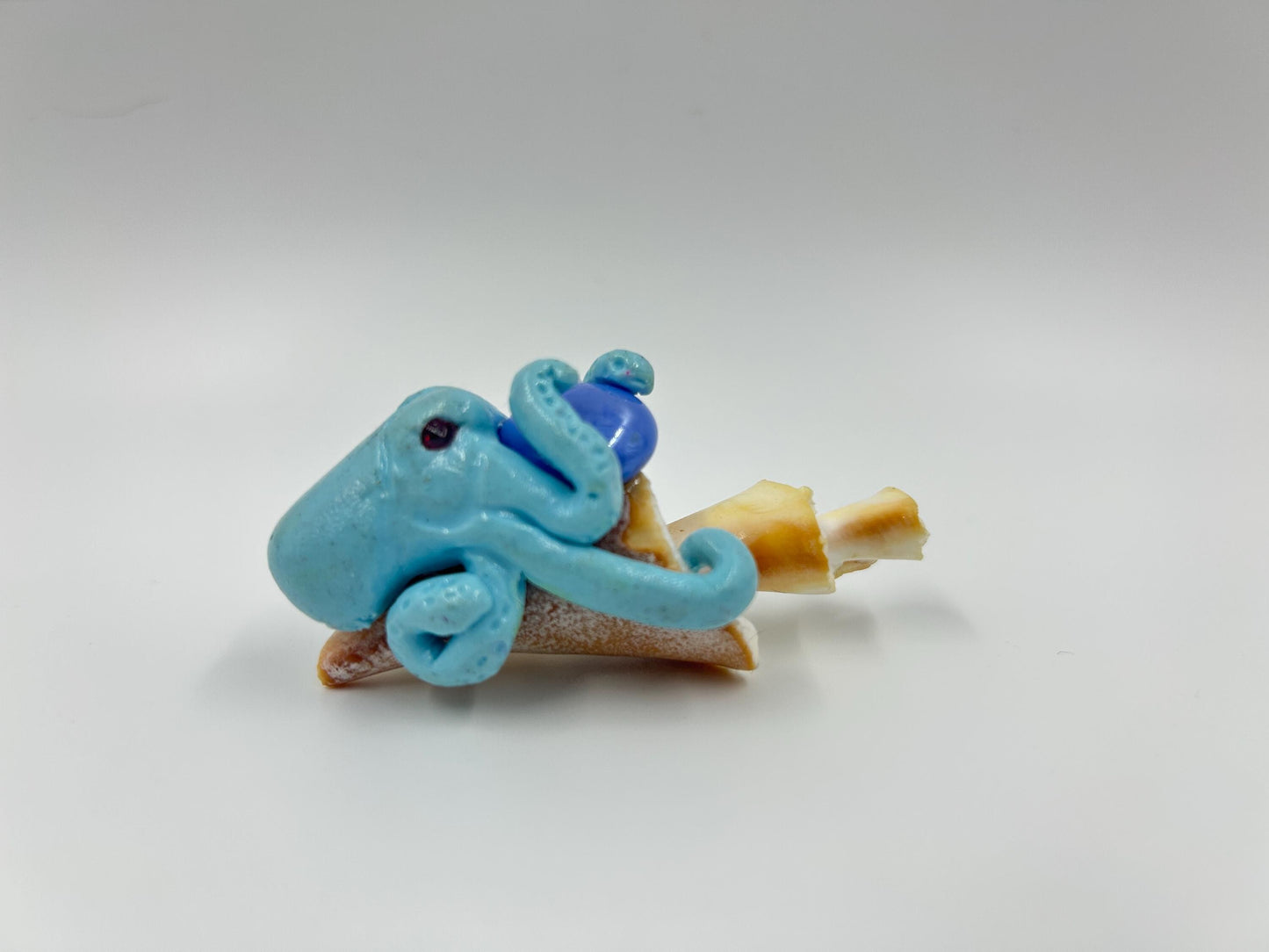 Octopus Sculpture – Handmade polymer clay octopus on seashell holding orb. Whimsical ocean art décor & sea lover gift.
