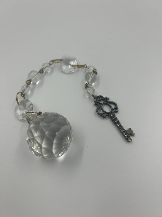 The Lightkeeper’s Key — Upcycled Chandelier Crystal Pendulum